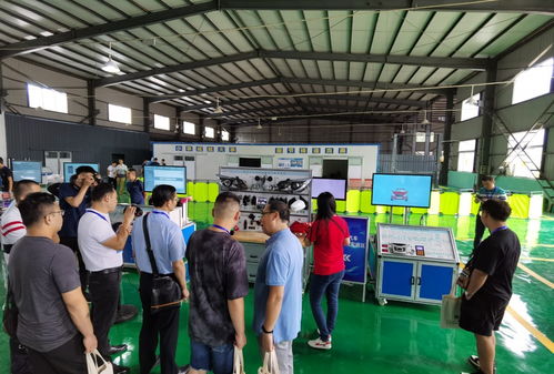 经销商伙伴实地参观和绪科技智能网联 新能源汽车研发设备并交流